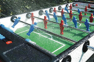 Rain falling on a football table.
