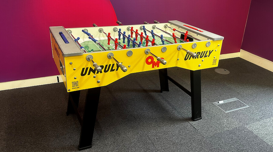 A branded foosball table.