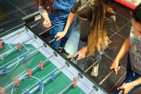 A coin-operated football table.