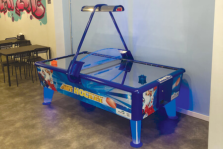 The Wik Gold air hockey table.