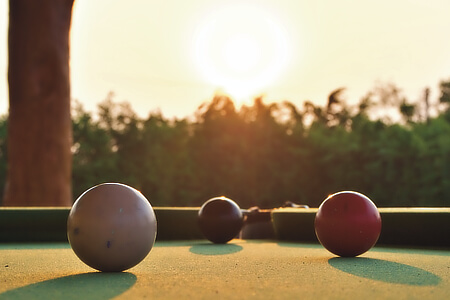 Playing pool in the sun.